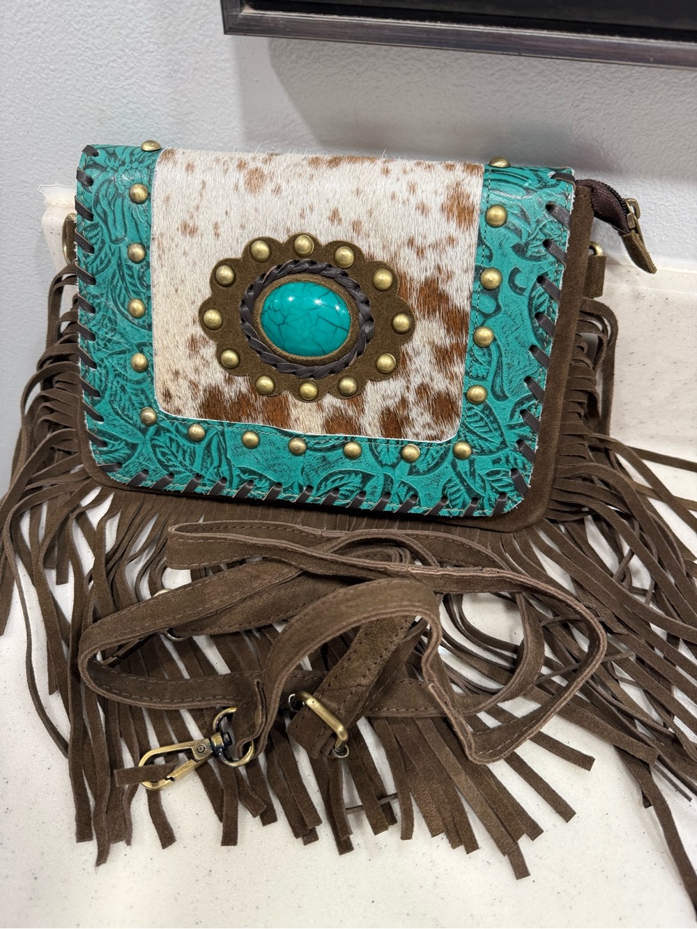 Turquoise Accent Fringe Crossbody Bag with Cowhide Detail